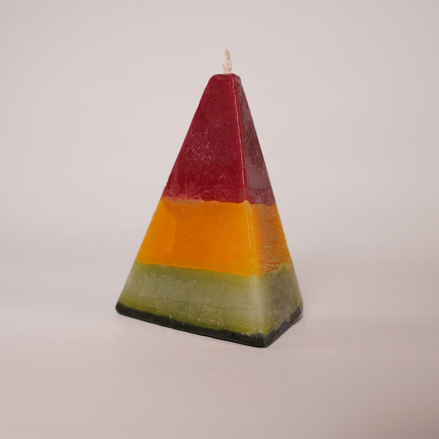 Tricolor Peak Candle – Artistic Pyramid Design